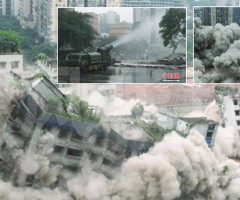 重庆闹市“雾炮”车助阵拆楼现场